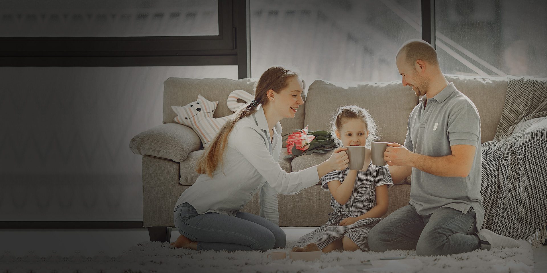 Close Up of a Happy Young Family Playing at Home